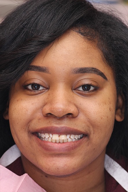Headshot of Chanique showing her teeth