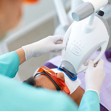 Patient receiving zoom teeth whitening