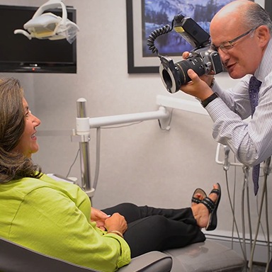 Dentist taking patient's picture