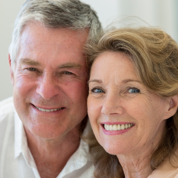 Older man and woman smiling