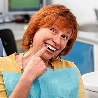 A diagram of a dental implant in Dr. Allan Mohr's best Massapequea dentist office