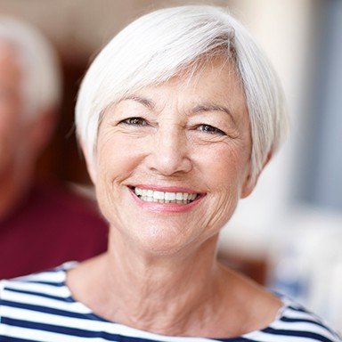 Closeup of a smiling elderly dental patient