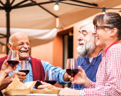 Group of seniors enjoying a meal at a restaurant