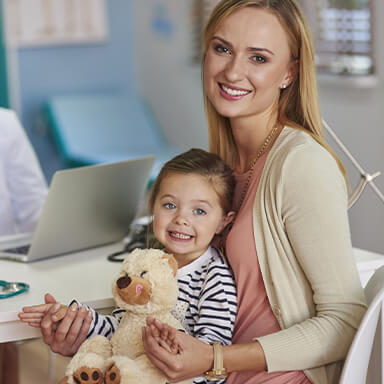 Child reciving dental checkup