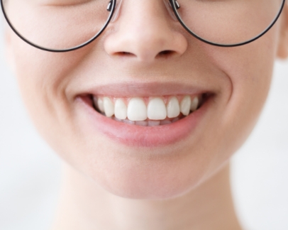 Close up of a person with flawless teeth smiling