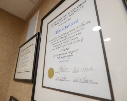 Framed certificate for Doctor Allan Mohr designating him a Fellow of the International Congress of Oral Implantologists