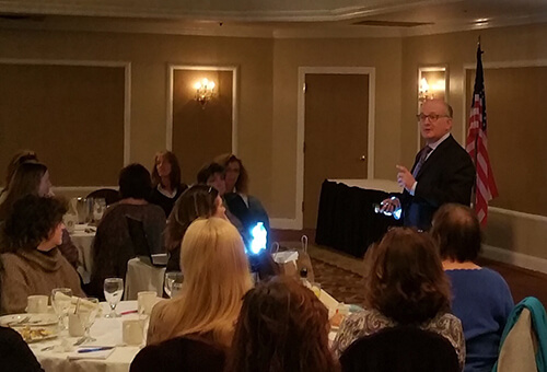 Dr. Mohr speaking at Long Island dental hygiene forum