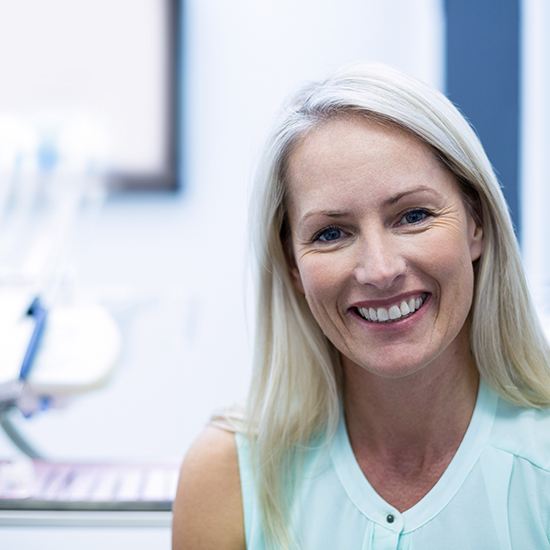 Female dental patient smiling