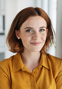 red haired woman smiling in Long Island