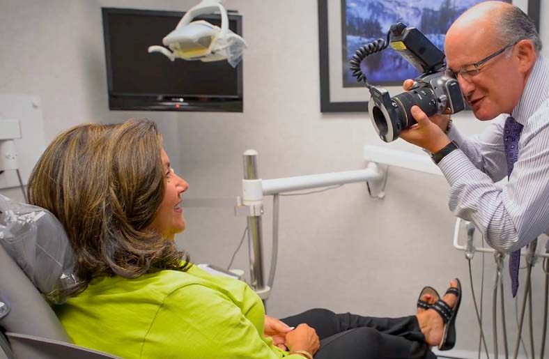 A photo of Allan Mohr with a patient