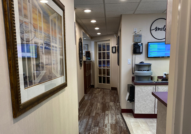 Hallway in dental office passing treatment area