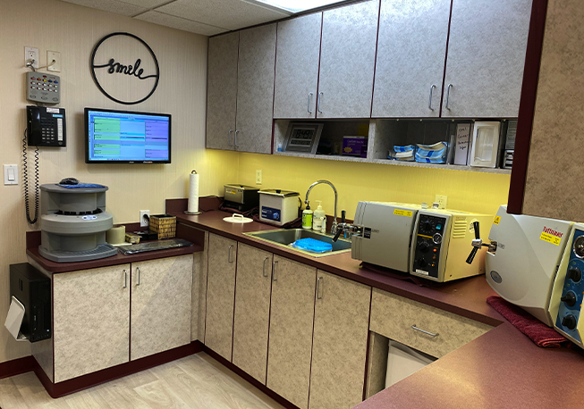 Table in dental office with sink and advanced technology