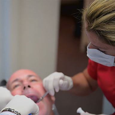 Patient receiving dental treatment