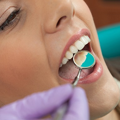 Woman receiving dental exam