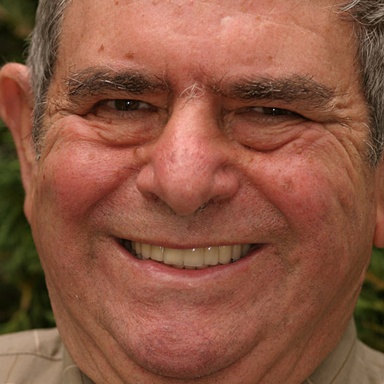 An older man smiling with great teeth