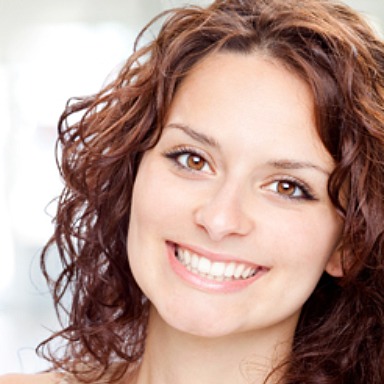 Young woman with a white smile