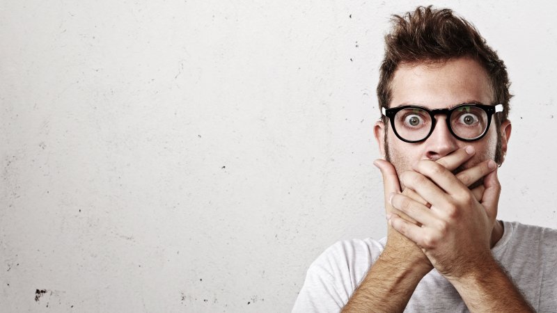 surprised man with glasses