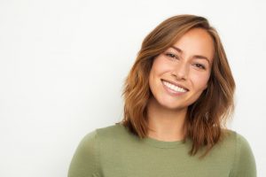 young woman with rehabilitated patchwork dentistry 