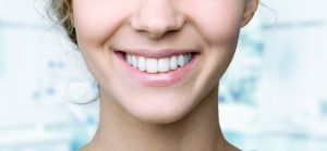 woman who has just gotten teeth whitening on Long Island 