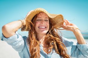 woman smiling after getting teeth whitening on Long Island 