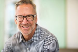 older man with perfect smile