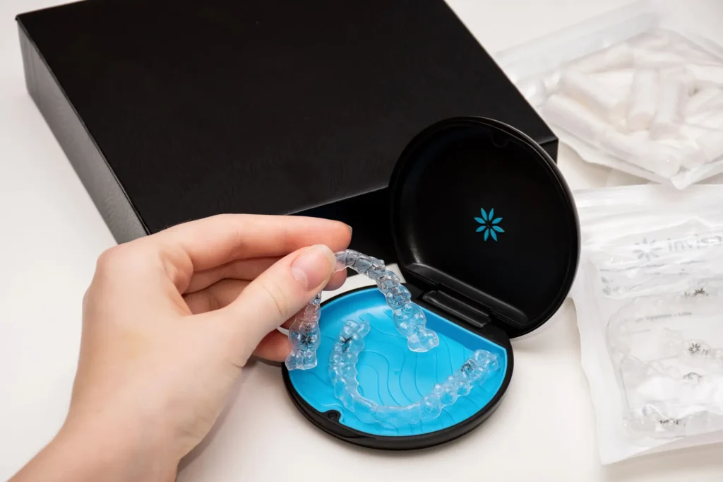 Invisalign Massapequa clear aligners in box for teeth straightening