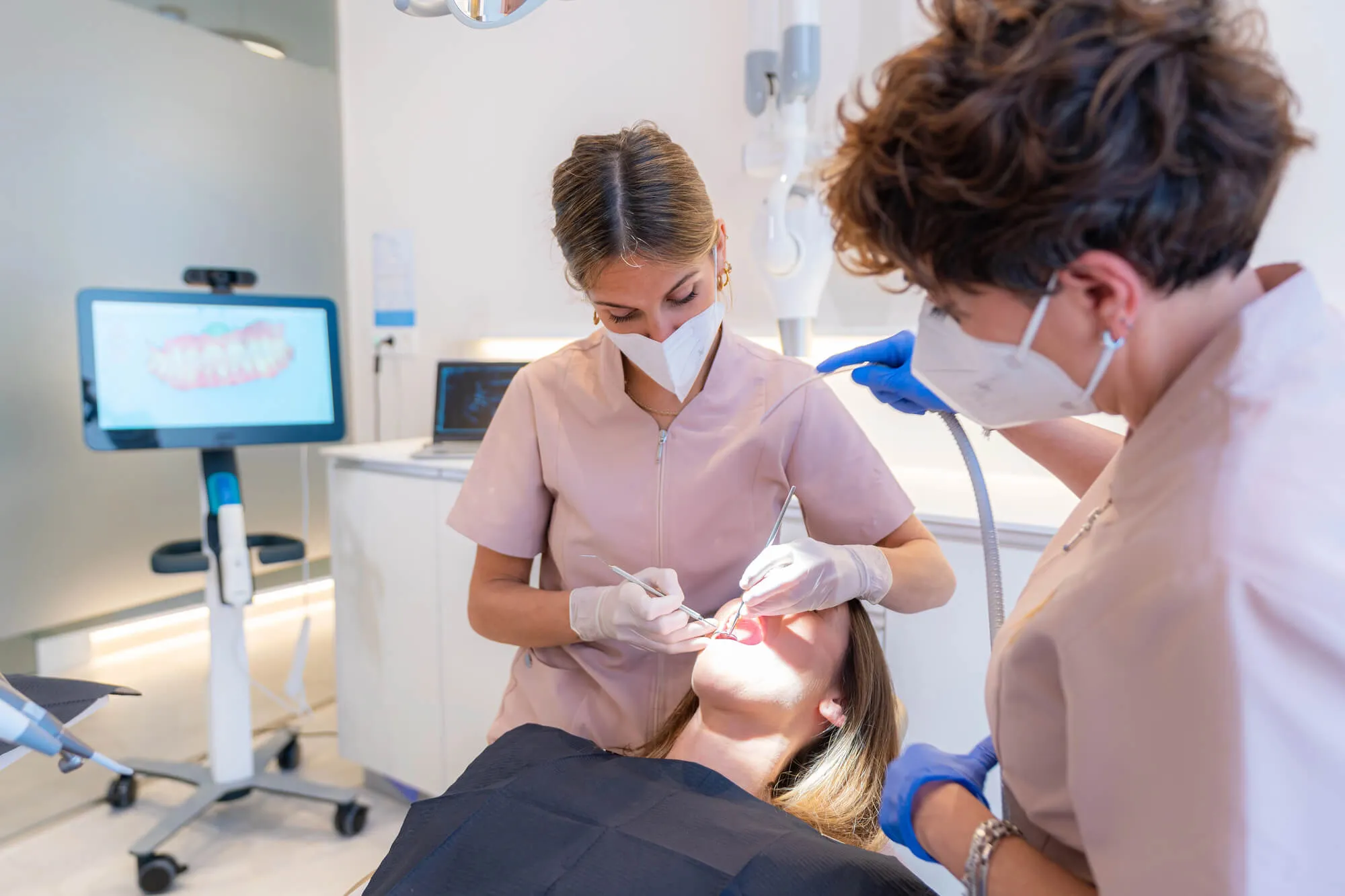 Orthodontist in Massapequa discussing dental hygiene with a patient