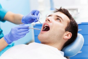 ThinkstockPhotos-man oral exam